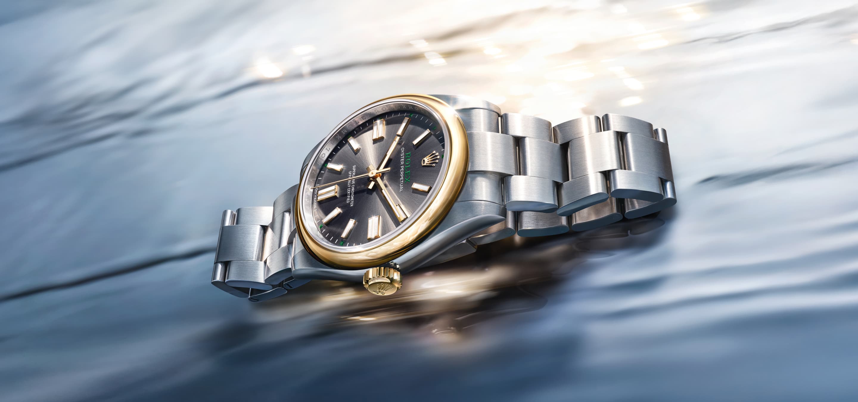 Rolex Testimonee Roger Federer wearing a Land-Dweller watch in a mountainous outdoor setting