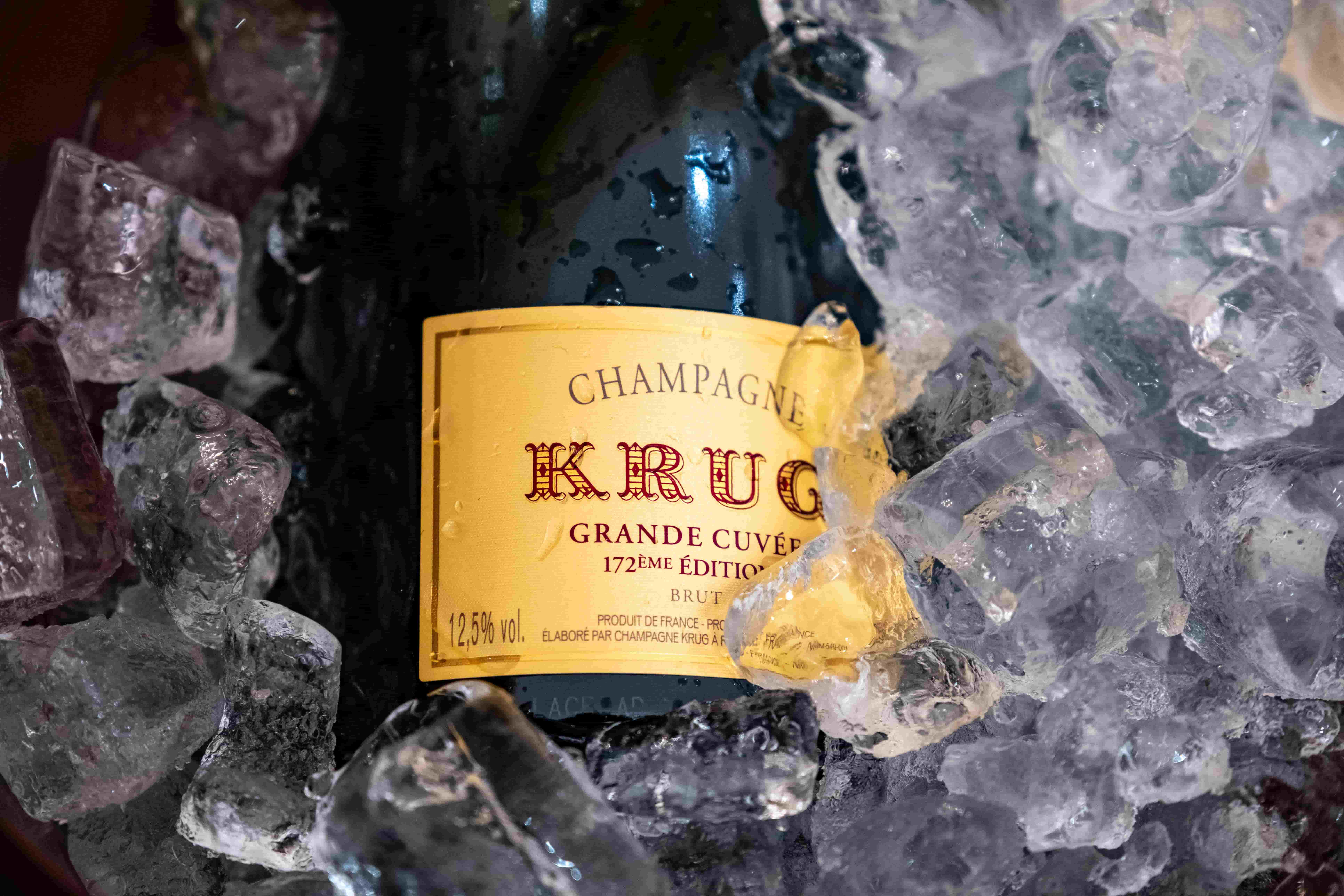 A bottle of Krug Grande Cuvée Champagne chilled in ice at the Chopard Lunar New Year event.